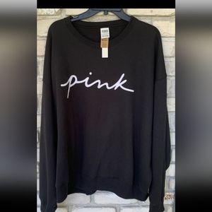 Pink Victoria Secret black sweatshirt.